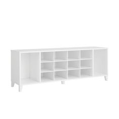 a white shelf with several compartments on it