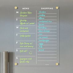 the menu board is hanging on the wall