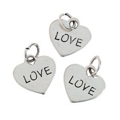 Heart-Shaped "Love" Charms. Share a symbol of your love! Give these charms out after your wedding reception or use them as part of a Valentine's Day craft. Silvertone metal Heart-Shaped "Love" Charms have "Love" etched into the center. They can be attached to key chains and gift bags. (3 dozen per unit) 1/2" © OTC Single Diamond Necklace, Diamond Necklace Wedding, Good Luck Necklace, Key Pendant Necklace, Diamond Evil Eye, Diamond Solitaire Necklace, Solitaire Necklaces, Metal Heart, A Symbol