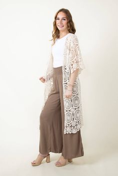 The perfect lightweight cardigan for transitioning into the warmer weather is this Long Swirl Crochet Kimono for Women in Ivory! Featuring a lightweight crochet construction, long length, and neutral color, this piece can be layered over any tee or brami! Features:Do everything in love Style: ZLC410052-IVORYColor: Ivory100% CottonWomen’s Cardigan3/4 sleeve length Open cardiganCrochet material with long swirl design Measurements from one size:Length from center back: 46" Swirl Crochet, Crochet Construction, Crochet Kimono, Do Everything In Love, Love Style, Lightweight Cardigan, Swirl Design, Neutral Color, Long Length