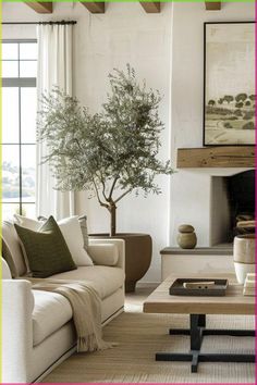 a living room filled with furniture and a tree in the middle of it's center