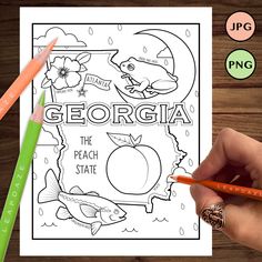 a person is holding a pencil and drawing a coloring page with the word georgia on it