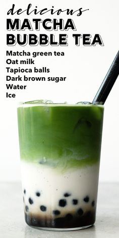 matcha bubble tea in a tall glass with black dots