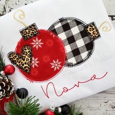 a christmas ornament with leopard print on it