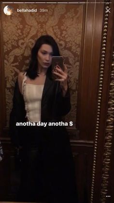 a woman taking a selfie in front of a mirror with the caption'another day another 3 '