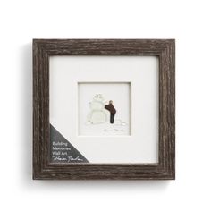 a white and brown frame with a polar bear in it