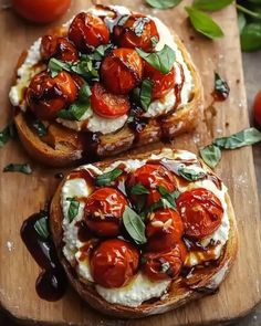 two pieces of bread topped with tomatoes and cheese