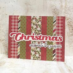 a christmas card with red and green stripes