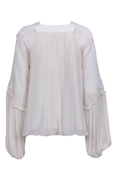 Be the blooming bohemian beauty you were meant to be in this white silk Chloe blouse. Flowing fabric romanticizes lace-detailed bell sleeves, for a perfect balance of sweet and stylish. A must-have for spring and summer sunshine-filled days! Size 4 (FR 36) Made in France Shell 100% Silk Braid 100% Polyester Yoke 58% Linen 42% Cotton Inner Yoke 100% Cotton Lining 100% Silk Pullover Square neckline Minor blemish on sleeve Minor run on back Bust 56" Waist 76" Shoulder to hem 25" Sleeve length 31" Buy Shoes Online, Peasant Blouse, See By Chloe, White Silk, French Fashion, Sweater Weather, Lace Detail, Formal Wear, Bell Sleeves