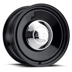 an old black wheel on a white background