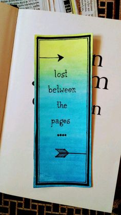 a bookmark with the words lost between the pages and an arrow drawn on it