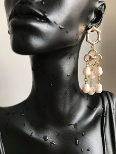 "🤗I'm very excited to present you a new pair of earrings that could make any woman satisfied and happy ! The earrings are composed of pearls and gold filled brass accessories. I used 6 pieces of pearls on each earring, that makes 12 pieces on a pair, the pearls doesnt not make any heaviness or pressure on the earlobe. The earrings are light and do not cause any kind of allergy 🙏 The pearls have a diameter of 8 mm , and have shiny white color . ❗ Feel free to contact me for item questions. Each item is individually wrapped in kraft jewelry gift box. If you want to add a gift note to the package, please leave a note in the \"add note to YouNiqueJewelscrafts\" message box at the checkout.🙏 🛫Please check your address details during the worder for excluding any unwanted problems ! Dont forg Pearl Chandelier Earrings With Pearl Chain As Gift, Metal Earrings With Pearl Chain For Gift, Metal Earrings With Pearl Chain As Gift, Elegant Beaded Drop Earrings With Pearl Charm, Party Chandelier Earrings With Pearl Drop Gold-plated, Gold Plated Pearl Drop Chandelier Earrings For Party, Gold Pearl Earrings With Dangling Beads As Gift, Metal Pearl Chain Earrings As Gift, Party Chandelier Earrings With Pearl Drop