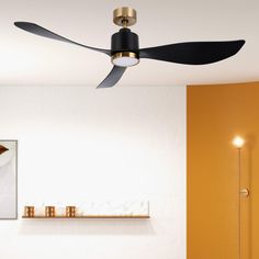 a modern ceiling fan in a living room