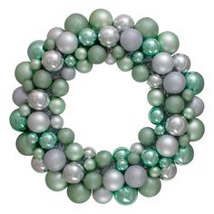 a green and silver christmas ornament wreath