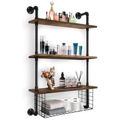 three tiered shelves with toiletries on them and soap dispensers next to each other