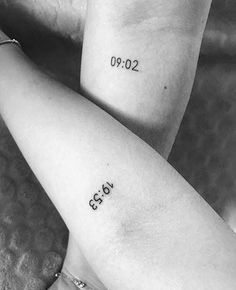 two people with matching tattoos on their arms, one has the date and the other has numbers