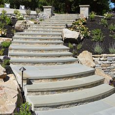 stone steps lead up to the top of a hill