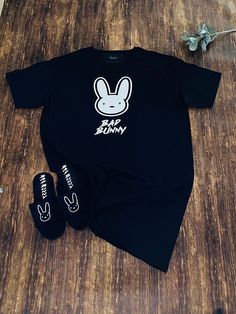 🚨PLEASE READ CAREFULLY  📌 Slippers are NOT included. Check out our store to purchase.  This Bad Bunny Pajamas Nightgown / T-shirt Dress can be used as an oversized sleep shirt is made of 100% cotton for extra comfort while you sleep. Or you can pair it up with some cute sneakers and wear it as a dress. Perfect for the Ultimo Tour Del Mundo concert. Wear it to the Bad Bunny World's Hottest Tour concert with some thigh high boots or cute sneakers. Wear it to sleep or as a beach coverup. 🎯It's t Bunny Items, Bunny Pajamas, Concert Wear, Bunny Hoodie, Bunny T Shirt, Bunny Slippers, Bunny Shirt, Minimalistic Style, Cute Sneakers