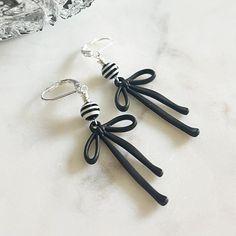 Astrid Bow Earrings Beetlejuice Earrings, Glow Forge, Strange And Unusual, Bow Earrings, Nickel Silver, Black Matte, Cute Earrings, Earring Necklace, Stretch Bracelets