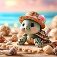 a small turtle with a straw hat on its head sitting in the sand next to seashells