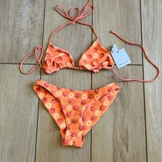 New Never Worn O’neil Daisy Bikini. Size Small, But Was Big In Bust For Me (A Cup) So I’d Say More Like A Medium On Top. Super Cute Retro Style, On The Brighter Side For Colors Fyi. No Pads In Top And I Noticed A Small Hole In The Back From This Being A Sample Item. I Think The O’neil Tag Was Removed There. I Have Further Discounted This Item. Orange Triangle Top Swimwear With Floral Print, Orange Floral Print Triangle Top Swimwear, Orange Halter Neck Swimwear For Spring, Orange Triangle Top Swimwear For Spring, Trendy Orange Swimwear For Summer, Orange Beachy Swimwear For Spring, On The Bright Side, Pink Beach, Aztec Designs