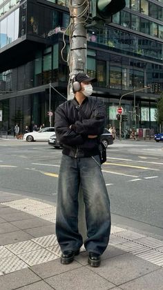 Embrace the relaxed vibe of a baggy jeans outfit. Perfect for laid-back days, they're the cornerstone of effortless street style. Posing Men Ideas, How To Layer Outfits Winter, Men Winter Outfits Street Style, Layering Outfits Men, Winter Fits Men, Streetwear Aesthetic Outfits, Baggie Jeans Outfit, Baggy Jeans Outfits