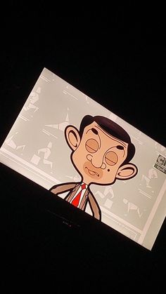 a cartoon character is projected on the screen