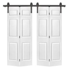 two white doors with black hardware on each side