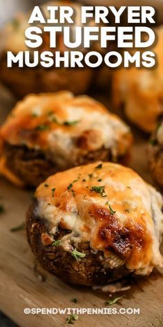 air fryer stuffed mushrooms on a cutting board with text overlay that says air fryer stuffed mushrooms