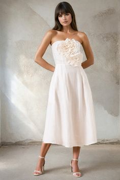 A chic strapless midi white linen dress with charming rose accents adorning the bodice, featuring invisible zippers and convenient pockets. Perfect for effortless summer style! LENGTH: Top of shoulder to hem 42" FABRICATION: 100% LINEN STYLE#. DR-21282 WHITE LINEN- WHITE *Dry Clean or wash on cold and hang flat to dry *Model is wearing size XS Linen White Dress, White Linen Dress, Party Cocktail Dress, White Linen Dresses, Yumi Kim, Apartment Life, Linen White, Daytime Dresses, Linen Style