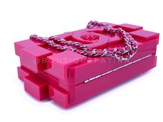 Chanel 2014 Pink Lego Brick Minaudière Plexiglass Clutch Shoulder Bag with woven chain in shiny ruthenium hardware.Woven chain can be tucked/hidden inside or carried as a crossbody.Dimensions are for the outside of the bag - will not carry an iPhone.In fuchsia pink plexigalss and shiny ruthenium hardware. Established 19 years ago, Boutique Patina has specialized in sourcing and curating the best condition preowned vintage Chanel leather treasures by searching closets around the world.Measures 8in. W (at widest point) x 4.7in. H x 2.5in. D Chanel 2014, Woven Chain, Chanel Purse, Exclusive Bag, Lego Brick, Fuchsia Pink, Beautiful Packaging, Fendi Bags, Vintage Chanel