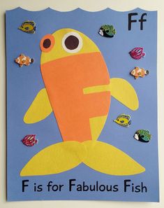 a paper cut out of a fish with the words f is for fabulous fish