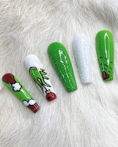 A gel polish, press-on nails set complete with green color, white and green glitter accents, and holiday movie detailing. Nail glue included in every purchase. Christmas Nail Art Easy, Christmas Manicure, Cute Acrylic Nail Designs, Christmas Nail Art Designs, Festival Nails