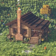 a small house in the middle of a lush green field with flowers and trees around it