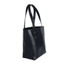 Introducing our brand new English Saddle Leather Tote Bag in Black. This open-top tote is roomy enough for a 15" laptop plus all your other daily essentials. Our range of buffalo leather bags is perfect for anyone after a bit more structure and sturdiness. Chic Everyday Bag With Lined Interior, Everyday Faux Leather Bags With Snap Closure, Classic Everyday Bags With Snap Closure, Modern Bag With Lined Interior, Classic Shoulder Bag With Lined Interior, Classic Shoulder Bag With Lined Interior For Shopping, Leather Shoulder Bag With Lined Interior For Shopping, Classic Tote Shoulder Bag With Lined Interior, Classic Tote Shoulder Bag With Snap Closure