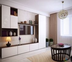 a living room filled with furniture next to a window and a table on top of a rug