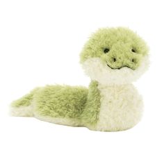 a green and white stuffed animal laying down