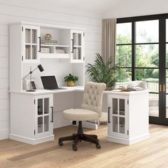 a white desk and chair in a room