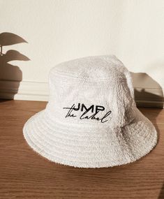 Our terry bucket hat is a beach life staple- it can be thrown in a beach bag when you are on the go and brings back that 90's retro vibe all while blocking the sun's powerful rays. Fabric Content: 100% Cotton Made in China Hand wash; Lay flat to dry Size: 56cm Bucket Hat White, Retro Vibe, Beach Life, Beach Bag, Floppy Hat, Lay Flat, The Go, Bucket Hat, Hand Wash