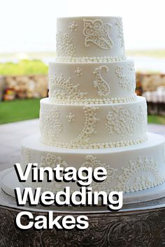 a white wedding cake with the words vintage wedding cakes on it's front cover