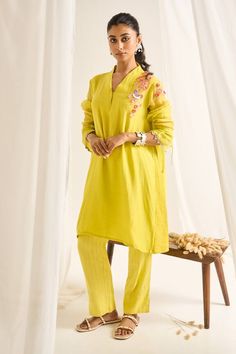 Lime green full sleeves V neck kurta with a gardenia bird crochet bloom embroidery on the shoulder and loop button on one side. Paired with a thread work pant. - Aza Fashions Traditional Spring Kurta With Set-in Sleeves, Green Long Sleeve Sets For Spring, Green Long Sleeve Spring Sets, Spring Sets With Resham Embroidery And Long Sleeves, Spring Resham Embroidery Sets With Long Sleeves, Green V-neck Resham Embroidery Kurta, Spring Green Sets With Chikankari Embroidery, Yellow Long Sleeve Kurta For Spring, Green Long Sleeve Sets With Floral Embroidery