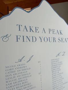 a sign that says take a peak and find your seat