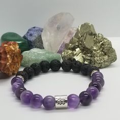 This Diffuser Bracelet Includes Lava Stones And Amethyst With A Rhinestone Accent. Amethyst Connects You To Your Intuition And Reminds You To Trust Your Ideas And Plans. Each Bracelet Is Uniquely Handmade With And Good Intentions. Charged Under The Fullmoon (Wolf Moon). Perfect For Gift Giving, Healing Practice And Spiritual Journey. All Bracelets Are Strung On .8mm Elastic Stretch Cord. 8mm Beads. Size 7 Inches. Part Of Fundraising Drive To Support My Son's Weekly Neurofeedback. Purple Spiritual Bracelet For Everyday Wear, Spiritual Purple Bracelet For Everyday Wear, Spiritual Purple Bracelet For Everyday, Spiritual Purple Bracelets For Everyday, Everyday Purple Amethyst Bracelet, Everyday Purple Bracelets With Natural Stones, Purple Bracelets With Natural Stones, Good Intentions, 8mm Beads