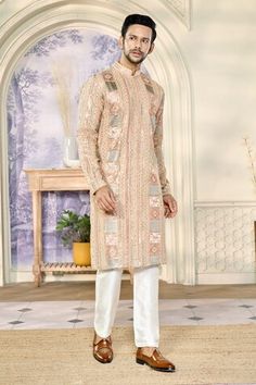 Peach full sleeves kurta crafted in georgette with all over fleur multi thread and zari embroidery and sequin highlights. Paired with a pant. - Aza Fashions Men Kurta, Zari Embroidery, Kurta With Pants, Full Sleeves, Mandarin Collar, Aza Fashion, Full Sleeve, Mens Pants, Sequin