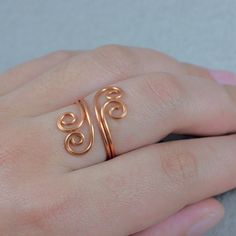 "This unique ring is handmade using copper. Free US shipping. Customers who purchased this item said: \"I'm addicted to the beautiful unique pieces from this seller. I haven't gotten anything from them I would send back. They are gorgeous. Now I have to make another order for another treasure I found. My favorite go to jewelry. \" ;-) My contact number: 626-379-1904. Please contact me if you would like to order multiples or customize a design for your special event, I will be pleased to give you Handmade Rose Gold Open Ring Jewelry, Handmade Rose Gold Midi Rings For Wedding, Rose Gold Hand Wrapped Ring As Gift, Handmade Rose Gold Toe Ring, Hand Wrapped Rose Gold Ring Gift, Wire Wrapped Open Midi Rings As Gift, Handmade Rose Gold Open Ring, Handmade Rose Gold Rings For Gifts, Copper Wire Wrapped Rings As Gift