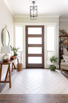 a living room filled with furniture and a door