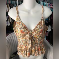 New With Tags. Super Cute Floral Blouse.Size Large With Adjustable Straps. Gives Off A Hobo Style Patterned V-neck Rayon Tops, Summer Rayon Cami Top, Floral Print Cami Top For Day Out, Chic Rayon Cami Top, Multicolor Cami Top For Vacation, Summer Patterned Sleeveless Top, Summer Sleeveless Patterned Top, Patterned Sleeveless Summer Top, Bohemian Printed Cami Top