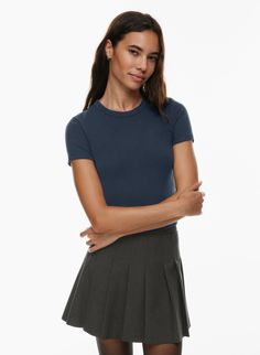 LITTLE RIBBED T-SHIRT | Aritzia Fitted Ribbed Crew Neck T-shirt, Solid Ribbed T-shirt For Layering, Trendy Crew Neck Top With Ribbing, Ribbed Fitted Crew Neck T-shirt, Trendy T-shirt With Ribbed Neckline, Fitted Crew Neck T-shirt For Layering, Trendy T-shirt With Ribbed Neckline For Layering, Ribbed Stretch T-shirt, Fitted Ribbed Crew Neck Top