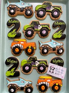 decorated cookies in the shape of monster trucks