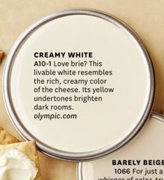 a can of creamy white sits next to some crackers